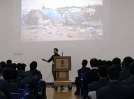 Out of sight but, please, not out of mind: old boy returns to School to give an update on the international refugee crisis